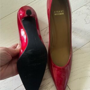 Patent leather red heels. Size 10. Worn once for an hour.